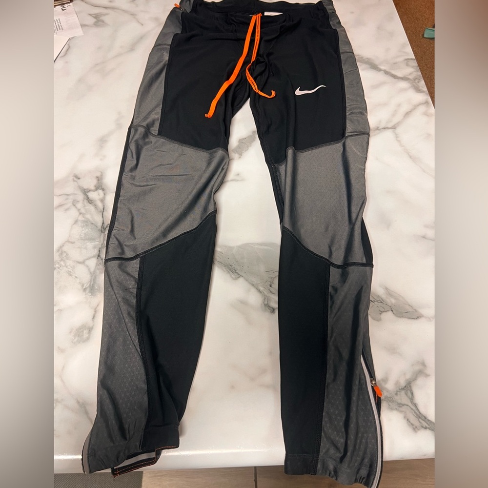 Nike Black and Gray Joggers with Orange Accents
